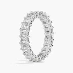 Emerald cut eternity band — side/profile (draft BN ref)